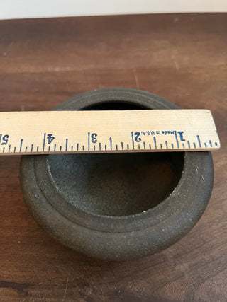 Mini black pottery vessel