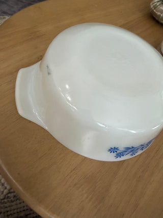 Anchor Hocking round milk glass casserole dish featuring the "Blue Flowers"