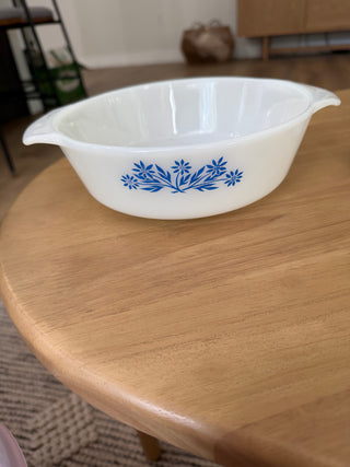 Anchor Hocking round milk glass casserole dish featuring the "Blue Flowers"