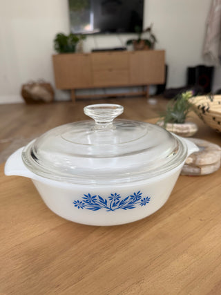 Anchor Hocking round milk glass casserole dish featuring the "Blue Flowers"