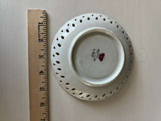 Reticulated iridescent yellow rose saucer