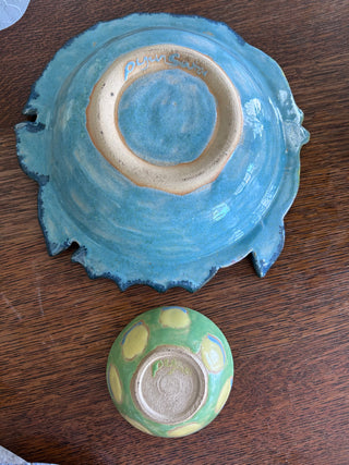 2 hand crafted pottery bowls fish + round