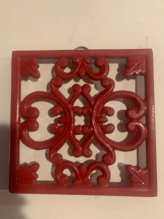Vntg red cast iron trivet (each)