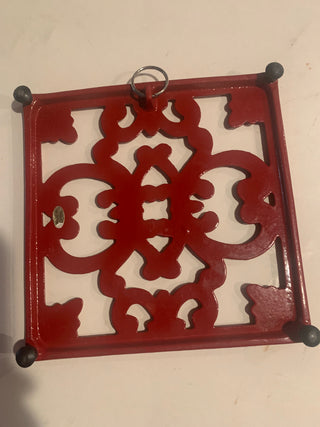 Vntg red cast iron trivet (each)