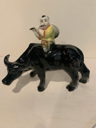 Vntg boy on water buffalo figurine