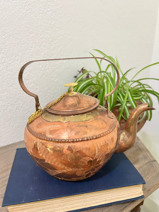 Vintage engraved copper tea kettle