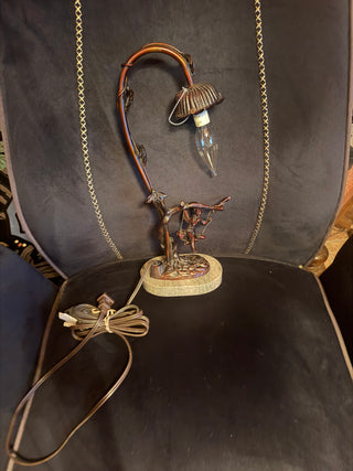 Vintage table lamp Marble base Cherub sitty on swing