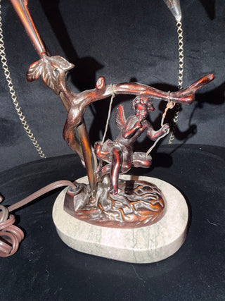 Vintage table lamp Marble base Cherub sitty on swing