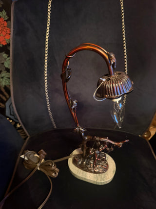 Vintage table lamp Marble base Cherub sitty on swing