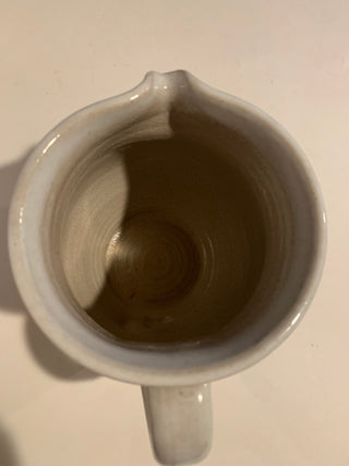 Vntg 7.5” hand thrown pottery pitcher Iris