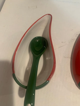 Red chili salsa bowl with lid and spoon