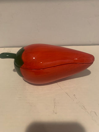 Red chili salsa bowl with lid and spoon