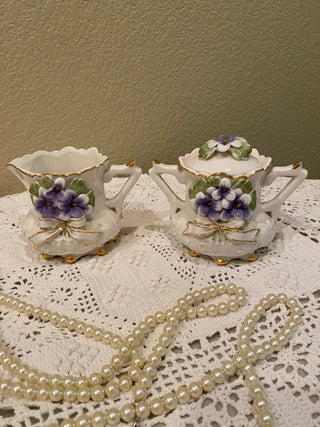 Vtg porcelain sugar bowl and creamer w bisque violets