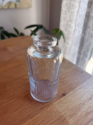 small clear glass bud vase