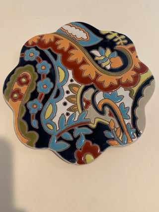 Anthropology, glazed, terra-cotta trivet, colorful