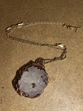 Gold tone white quartz necklace