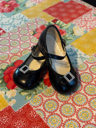 Mary Janes black patent shoes