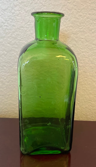 Vintage green glass medicine bottle