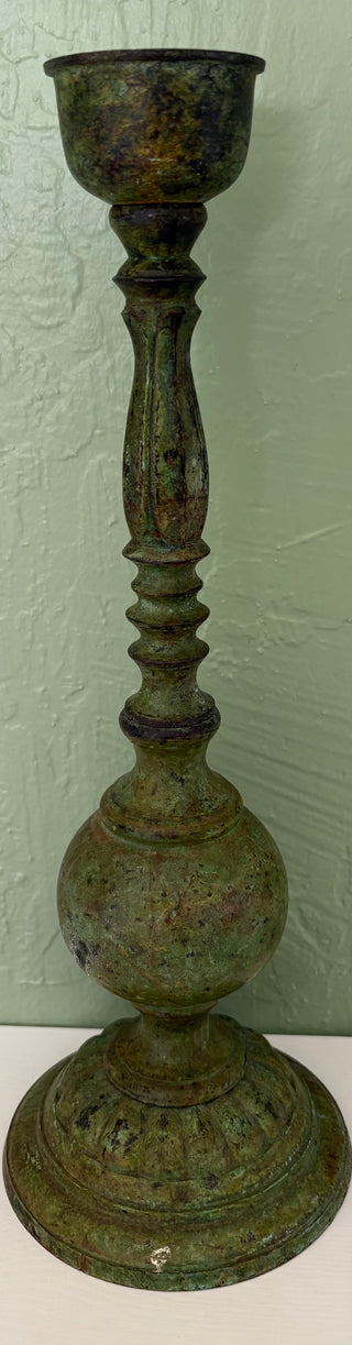 vintage brass candlestick featuring a deep, aged patina