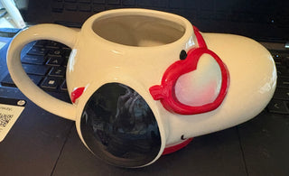 snoopy mug with heart shaped glasses