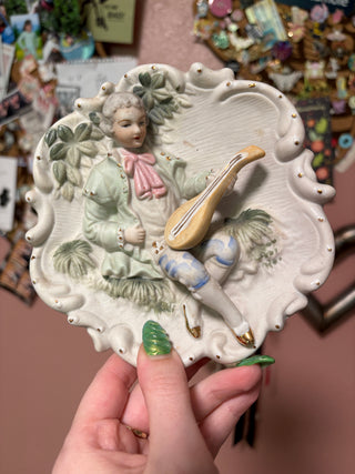 Andrea Sadek ceramic wall hanging - man with flute
