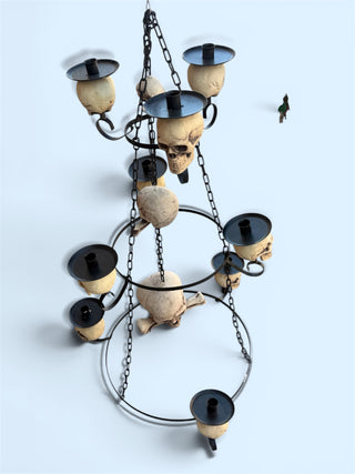 Three- tiered candle holder  Skull chandelier with 10 med. , 1 Lg  & Extra Sm. Skulls