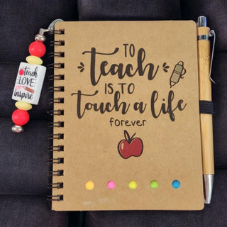 Notebook w/Matching Pen & Beaded Bookmark 4.09"x5.31" Teach Love Inspire RSVNotebook w/Matching Pen & Beaded Bookmark 4.09"x5.31" Teacher Life RSV|71124