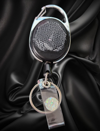 Carabiner with Belt Clip Interchangeable Badge Reel with Retractable Reel. Badge Button: Holographic Diamond Swirl. Our Interchangeable Badge Reels are made to be used with our Interchangeable Badge Reel Charms.|63932