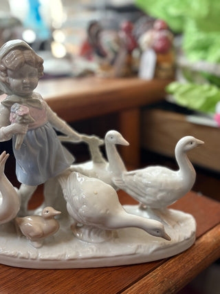 Japanese Reproduction of "Little Girl w/Geese, porcelain figurine 8"x8"