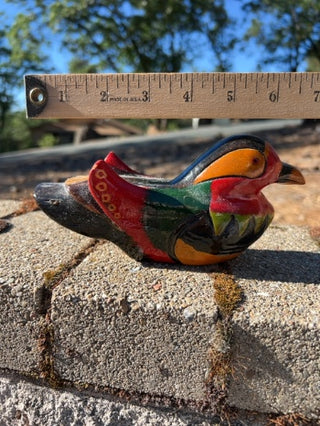 hand-painted wooden figurine Mandarin duck or a similar waterfowl