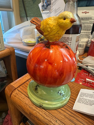 Baby Bird on Orange Orb, atop green circular stand, 6.5" RCD|92943