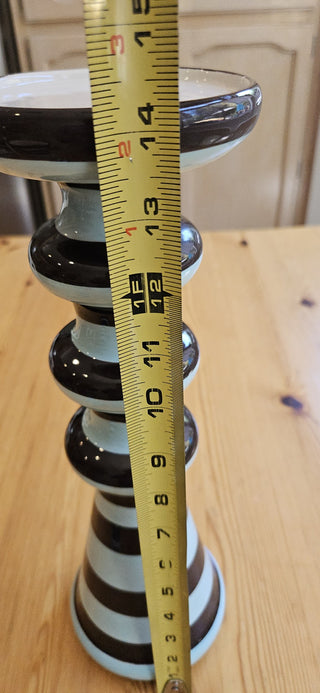 14" Tall candle holder/pedistal distinctive striped pattern in brown and light blue, with a stacked, rounded, and tapered shape.  RSVL|111558