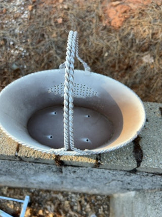 distressed white metal oval basket punch out details