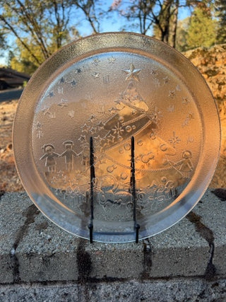 vintage 13-inch clear tempered glass Christmas serving platter featuring an embossed holiday scene