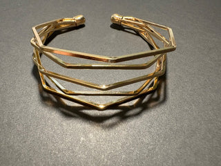 gold colored bangle RSV geometric|87359