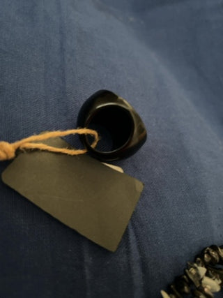 Large black and gold ring