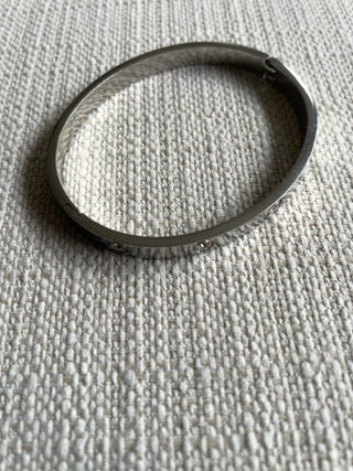 Silvertone bangle bracelet with clear crystals