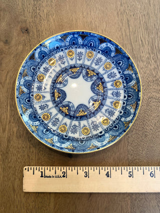 Antique porcelain blue and 22k gold saucer