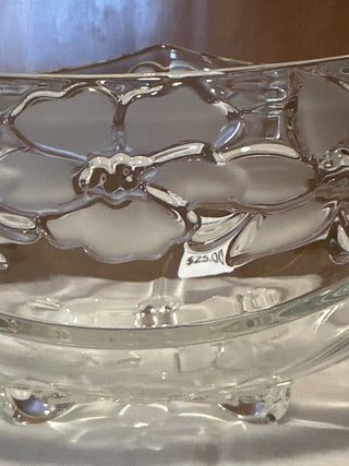 Triangular footed crystal bowl with embossed floral design.  #SM. RSV