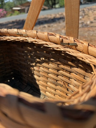 handcrafted basket wooden swinging handles