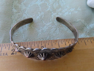 Silver tone cuff bracelet w/conchos RCD