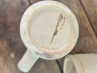 10H Signed pair pottery mugs  MTS
