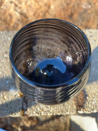 JP 5” amethyst art glass goblet with an optic swirl pattern and a short footed base