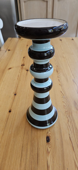 11" Tall candle holder/pedistal distinctive striped pattern in brown and light blue, with a stacked, rounded, and tapered shape.  RSVL|111552
