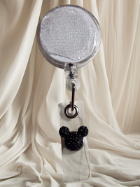 Belt Clip Interchangeable Badge Reel with Retractable Reel. Badge Button: Black Diamond Mouse Head. Our Interchangeable Badge Reels are made to be used with our Interchangeable Badge Reel Charms.|63719