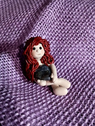 Goddess with reddish brown hair