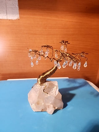 Beautiful handmade swarovski crystal tree on a huge quartz crystal base