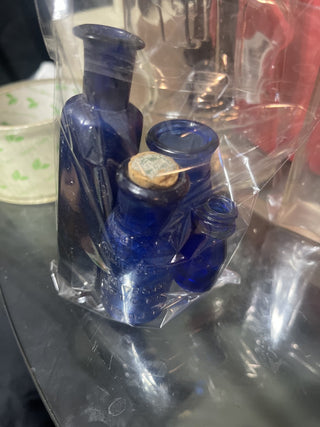 Five small cobalt blue bottles rsv