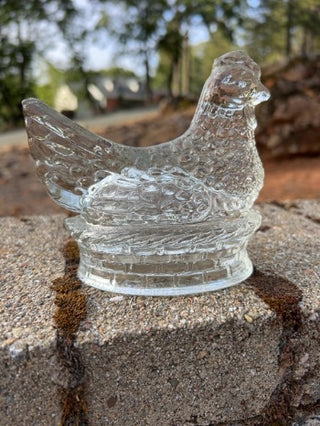 vintage collectible is a clear glass "Chicken on the Nest" candy container