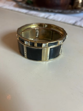 pair of vintage gold-tone hinged clamper cuff bracelets